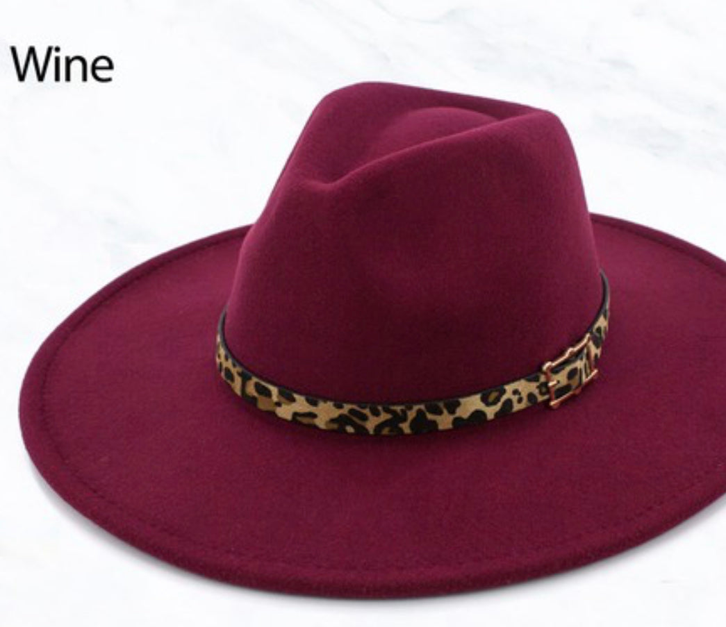Wine wide brim hat with leopard print band and gold buckle. Available sizes: S, M, L.
