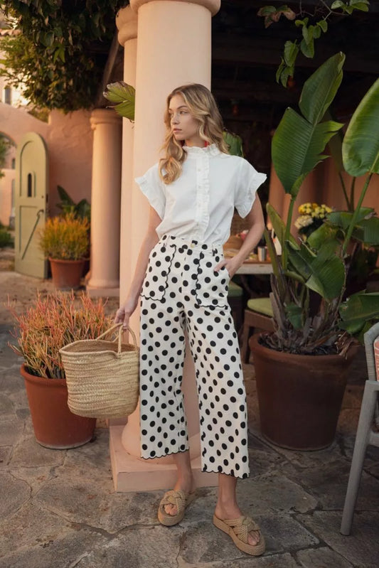 Black HW Wide Scallop Detail Polka Dot Pants, high-waist, wide-leg. Available in sizes XS-XL.