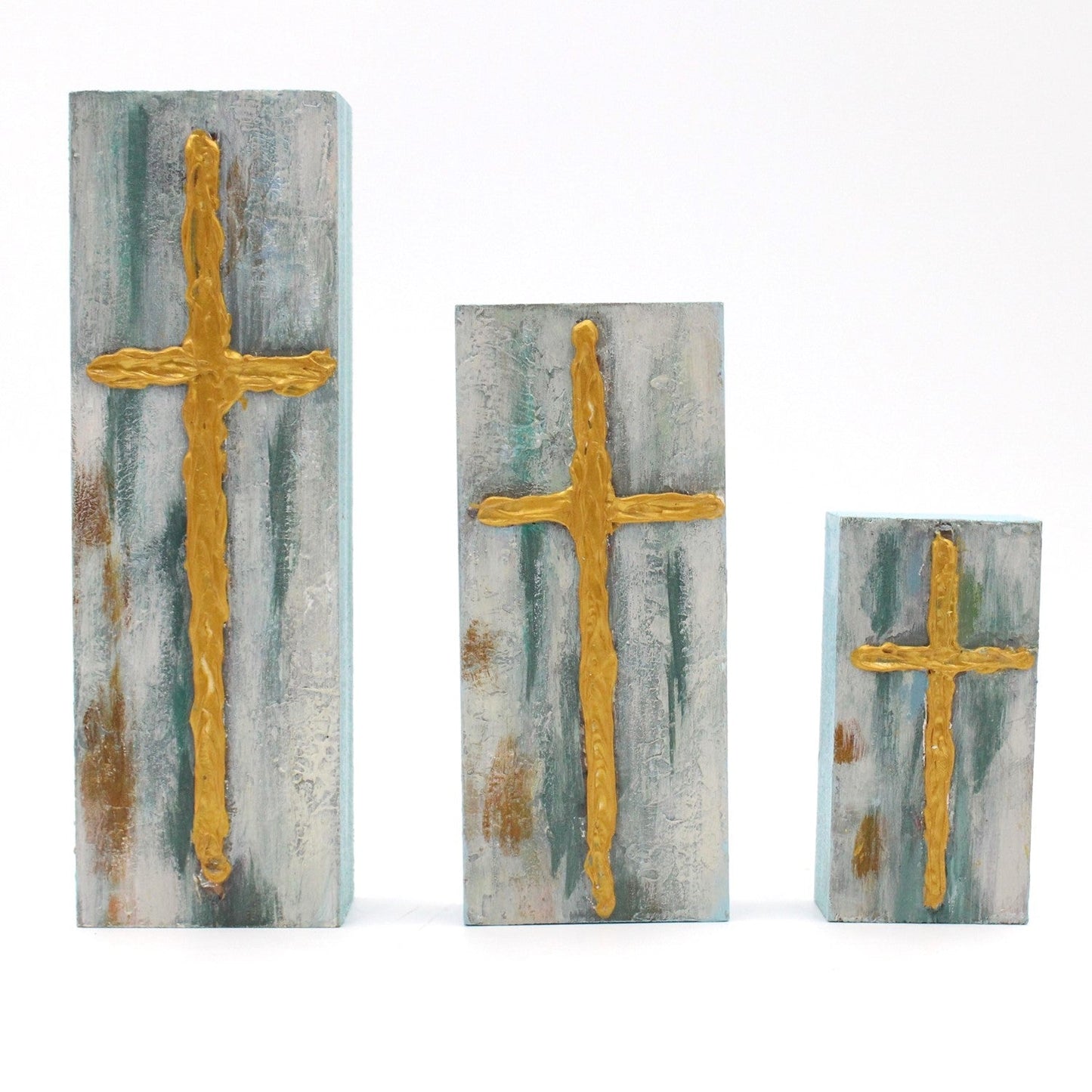 Wood Block with a handpainted gold cross on marbled blue, white, and brown. Available sizes: 4x4", 6x6".