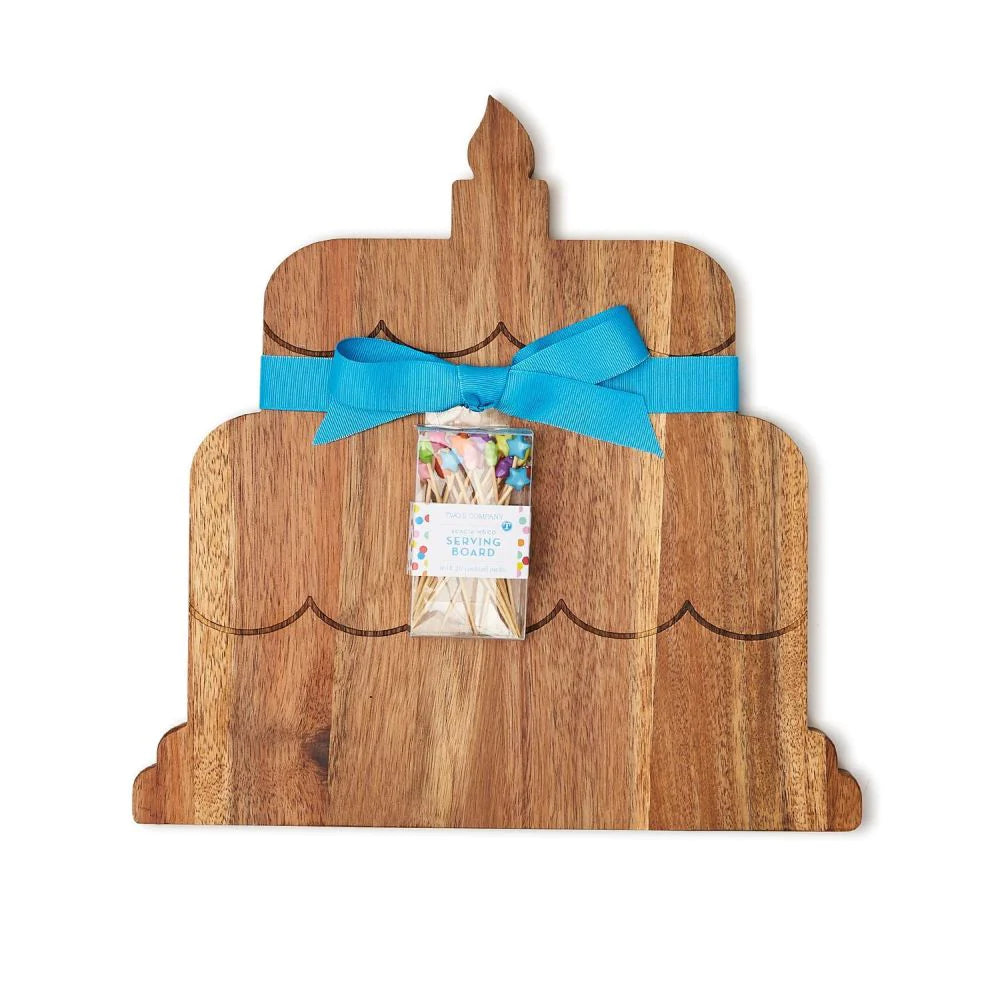 Tiered, cake-shaped acacia wood board with engraved lines, blue ribbon accents, and center toothpicks. Sizes: small, large.