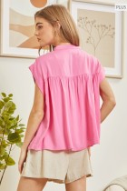 Anne Pleated Button Down Top in bright pink features cap sleeves and front pleat detailing. Available in sizes XS–XL.