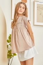 Anne Pleated Button Down Top in light pink with cap sleeves. Available in sizes S, M, L.