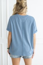 Two-Tone Waffle Knit Top in light blue. Loose fit, round neckline, long sleeves. Sizes available: S, M, L, XL.