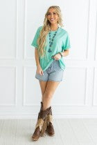 Two-Tone Waffle Knit Top featuring a relaxed fit and textured fabric. Available in sizes S, M, L, XL.