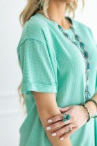 Two-Tone Waffle Knit Top with subtle V neckline. Available in sizes S, M, L, XL.