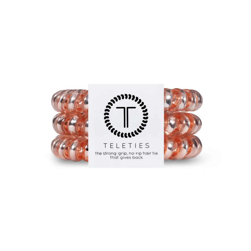 Pack of three transparent peach TELETIES hair ties. Sizes: Small, Large.