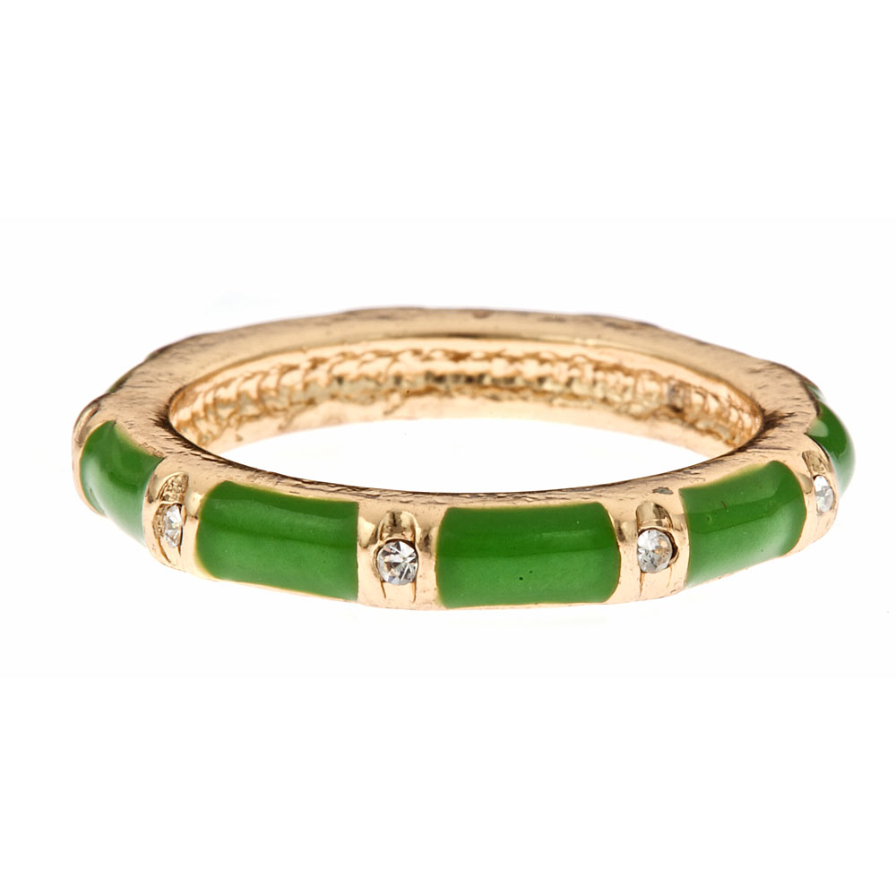 Gold ring with green enamel segments and clear gemstones. Stackable design. Available in sizes 5-9.