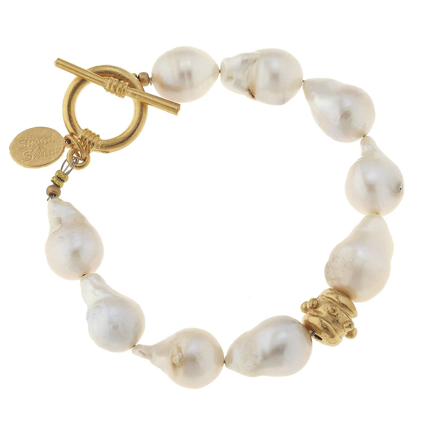Bracelet with large irregular white freshwater pearls, gold toggle clasp, accent bead, small round engraved tag. Sizes: S/M/L.