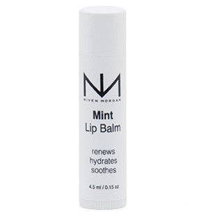 White Mint Lip Balm tube, labeled "renews, hydrates, soothes." Paraben-free. 4.5ml (0.15oz) size.