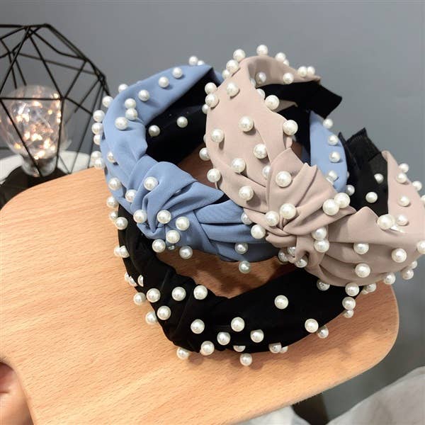 Set of three wide headbands—blue, beige, black—embellished with small white pearls. Available in S, M, and L.