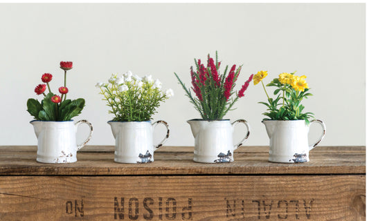 Four faux flowers in a distressed pitcher with "NO POISON" stamp. Unique blooms. Sizes available: small, medium, large.