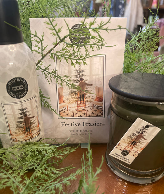 Festive Frasier candle, 8.5 oz, up to 70 hours burn, fresh cut fir scent, cozy holiday packaging.