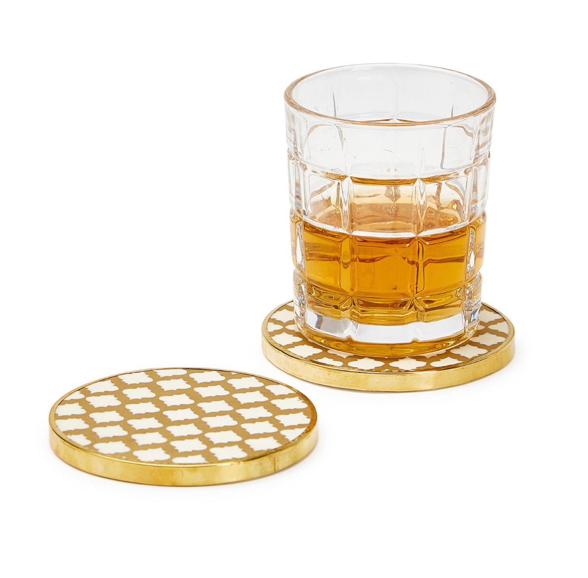 Round gold-rimmed coaster with white geometric pattern; available sizes: set of 4.