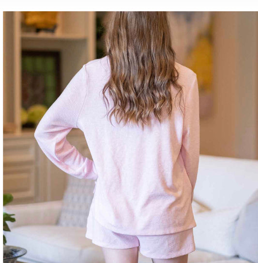 Light Pink Brushed Hacci High Low Pullover; soft fabric, high-low hem. Available in sizes XS–XXL.