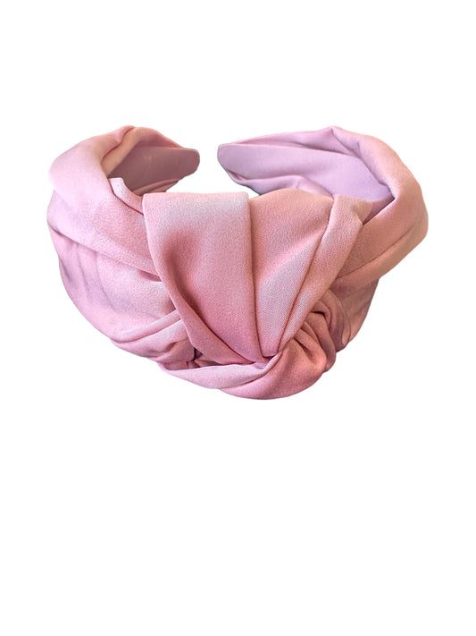 Pink silk knotted headbands with a front twist; available in S, M, and L sizes.