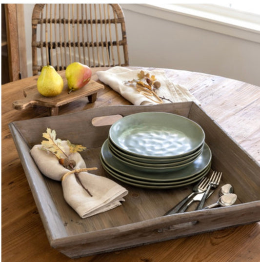 Reclaimed Wood Tray with Handles (21x21) holds stacked green plates, wrapped napkins, and silverware. Size: 21x21.