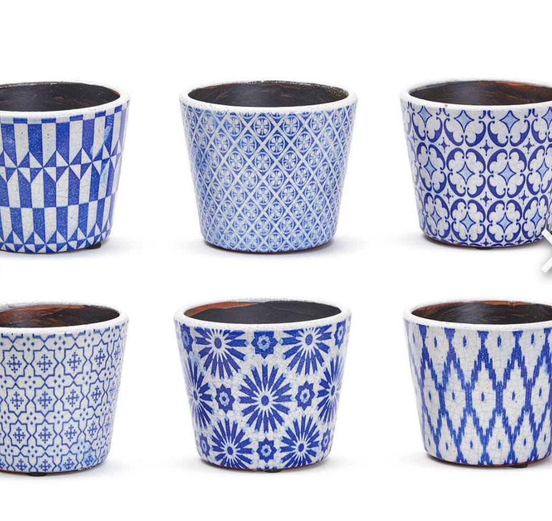 Six Indigo Collection 5.5” terracotta pots, each with unique blue and white geometric or floral designs.