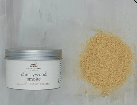 Open tin of "Cherrywood Smoked Season Salt"; finely ground light brown salt. Available in 4oz and 8oz sizes.