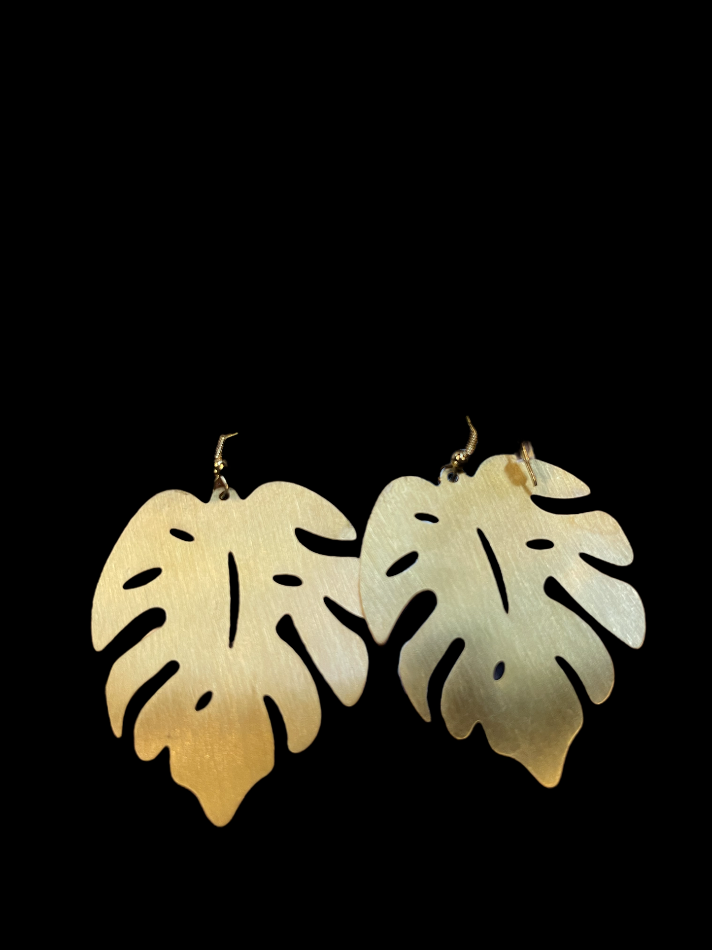 Monstera Gold Earrings: lightweight, leaf-shaped; available in small, medium, and large sizes.
