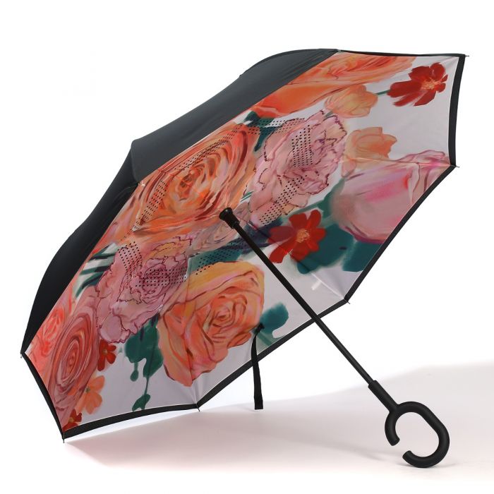 Black umbrella with bold pink, orange, and red floral interior, C-shaped handle. Sizes available: small, medium, large.