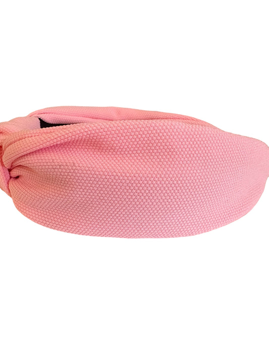 Textured light pink Waffle Headband with twist design. Available sizes: S, M, L.