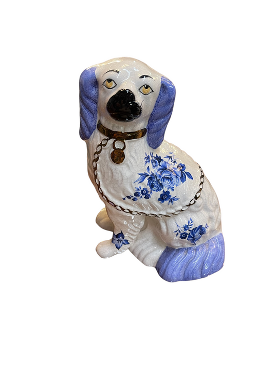 Blue and white Staffordshire Dog figurine with blue ears, tail, floral designs, gold collar; 8 3/4" tall.