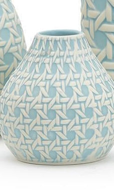 Light blue ceramic vases with rounded shape, narrow opening, white geometric pattern. Available in small and large sizes.