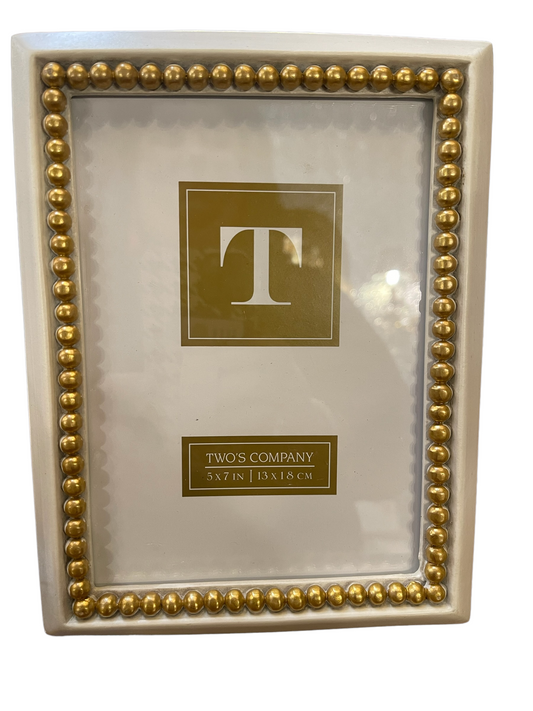 Rectangular white 5x7 frame with gold beaded trim, reflective surface, velvet back. Size: 5x7 in (13x18 cm).