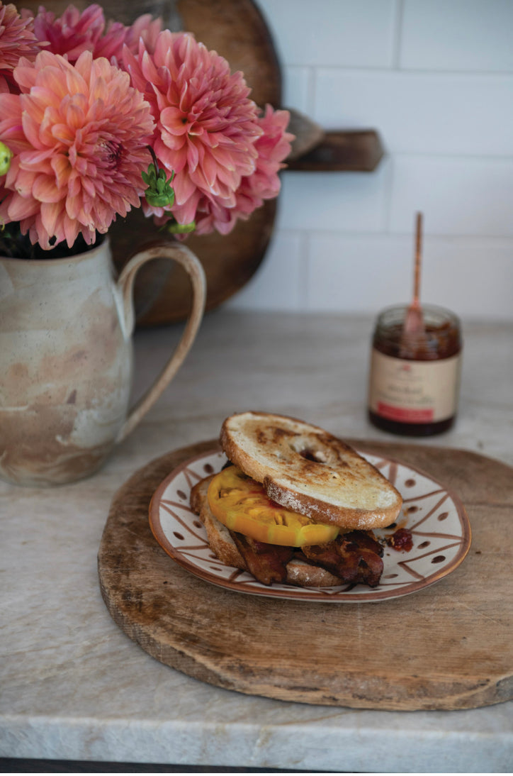 Smoked Tomato Truffle Jam jar with spoon. Available in 8oz and 16oz sizes.