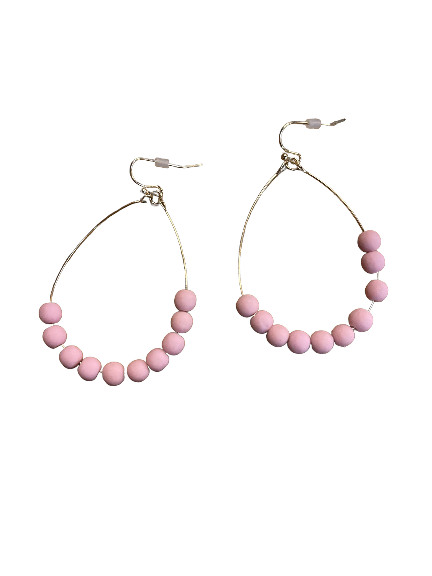 Thin gold hoop earrings with eight matte pink beads on the lower half. Available in small, medium, and large sizes.