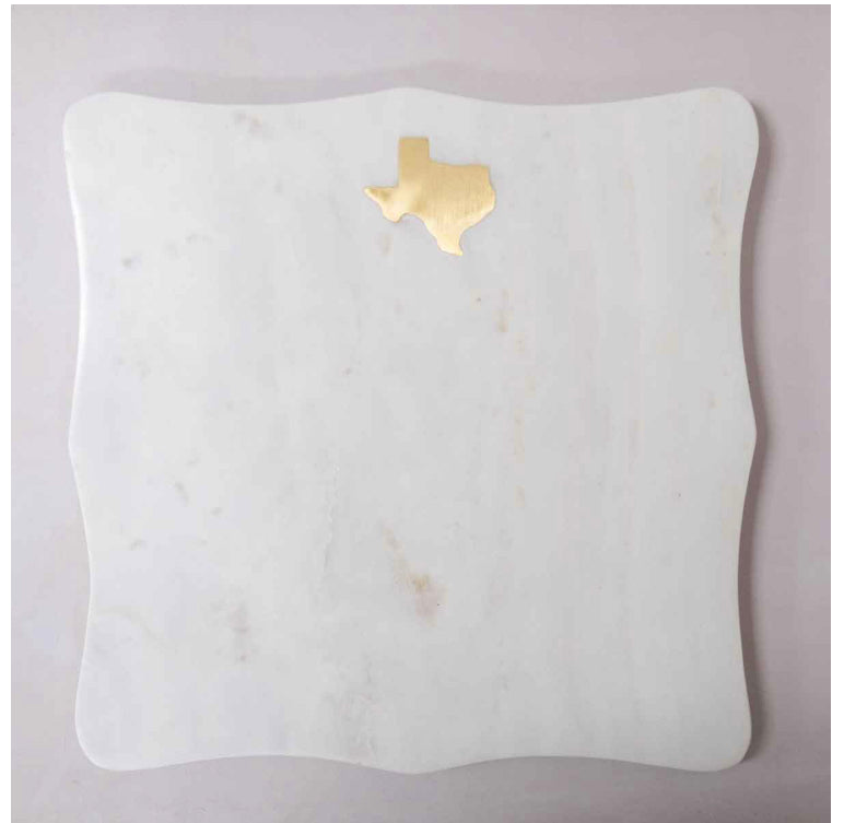 White marble serving board with scalloped edges, gold Texas outline at top center. Available in various sizes.