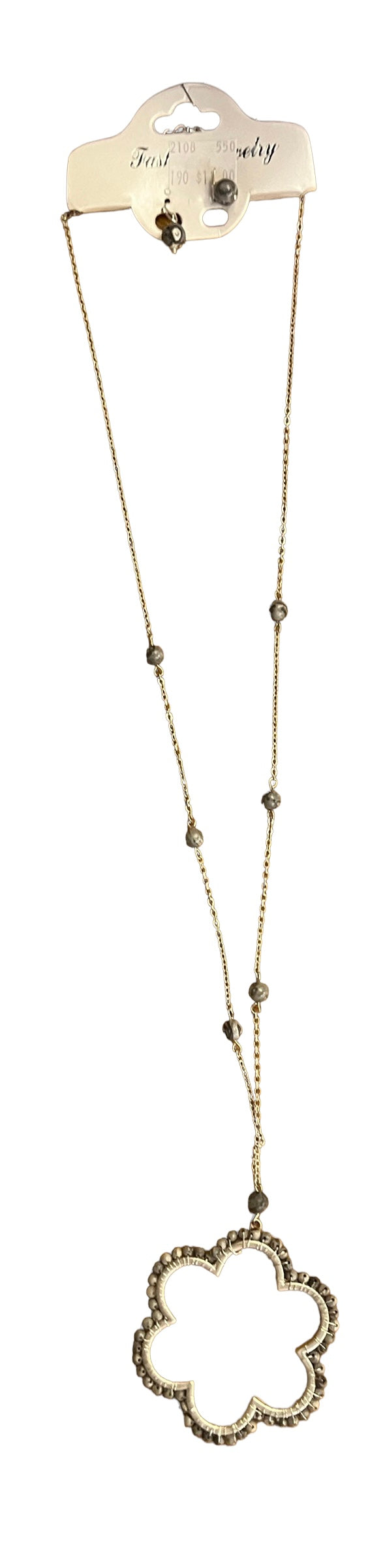 Delicate gold chain with small beads and a large textured flower pendant. Available sizes: 16", 18", 20".