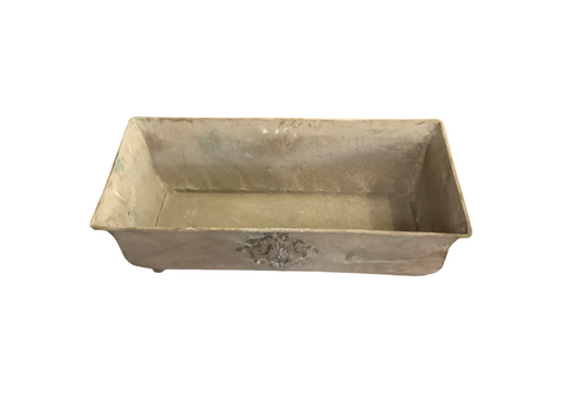 Antique planter, tan in color, with feet