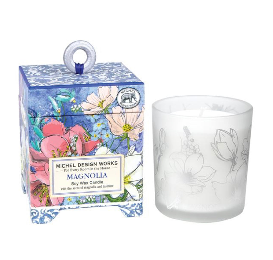 Magnolia Soy Wax Candle in frosted glass holder with floral designs. Sizes available: Not specified.