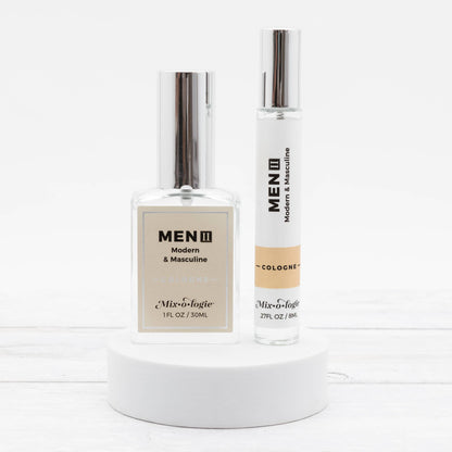 Two bottles of Men’s II Cologne Spray, 30 mL, one larger with a silver cap, the other slim. Minimalist labels.