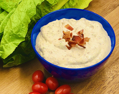 Blue bowl of creamy BLT Dip Mix topped with bacon bits. Available in small, medium, and large sizes.