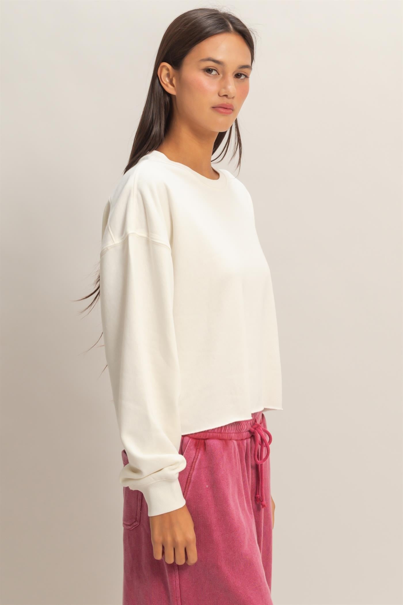 Cropped Mineral Wash Sweatshirt in cream, boxy fit. Sizes: XS-XL.