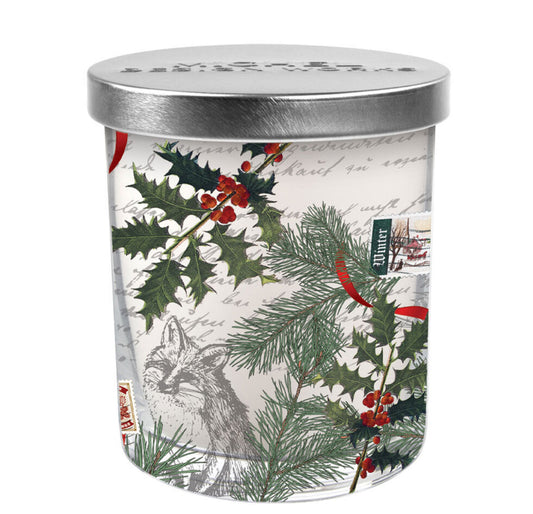 The WinterWoodland Jar Candle features a silver lidded jar with pine branches, holly, and red berries. An intricate fox sketch and vintage text complete the winter-themed design. Available in 8 oz and 16 oz sizes.