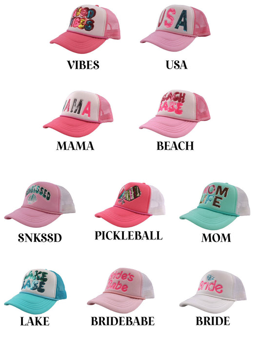 Simply Southern Sequin Hats with bold words like "VIBES," "MAMA," "BEACH"; available in one size fits most.