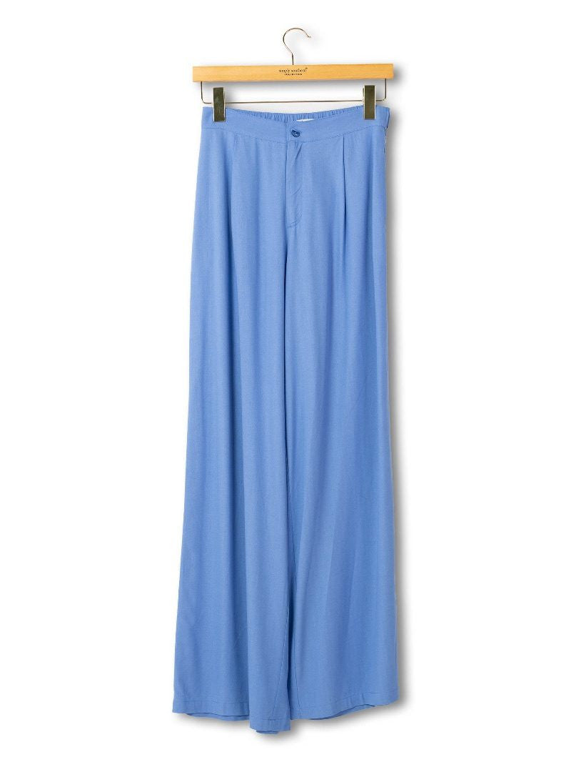 Azure Blue Wide Leg Pants with high waist and button closure; loose fit. Available in sizes XS-XL.