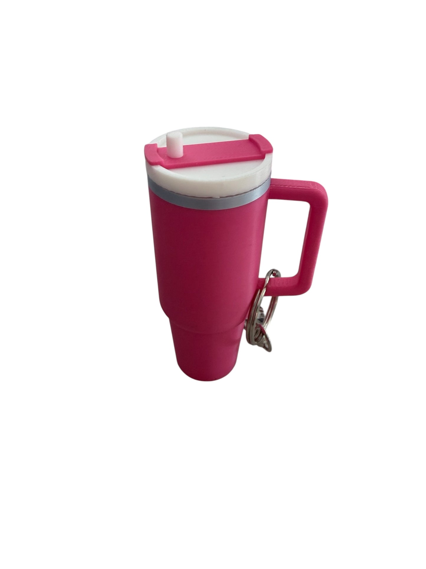 Pink mug with handle, white lid, secure storage, and key ring attached; available in multiple sizes.