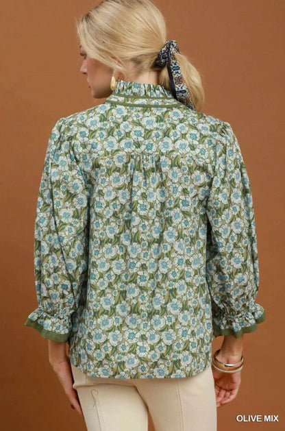 Floral Mandarin Collar Blouse: lightweight blue floral top with puffed sleeves. Available in sizes XS–XL.
