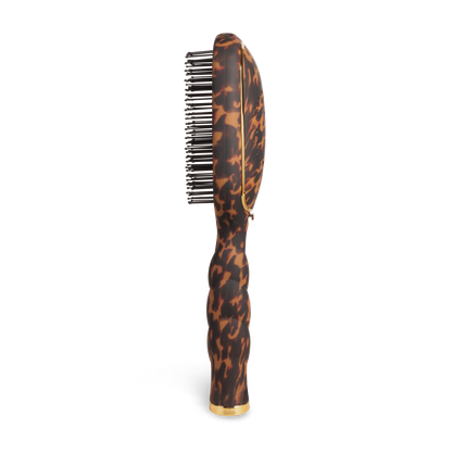 The Detangler Hair Brush for Thick Hair - Tortoise has a brown and black tortoiseshell pattern, curved ergonomic handle, and black bristles. Available in multiple sizes.