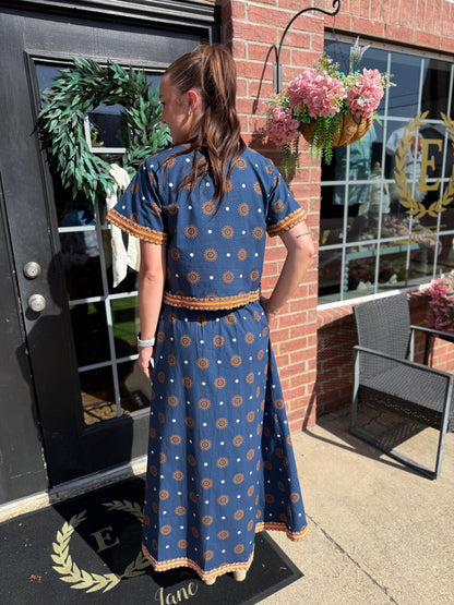 Auburn Medallion Skirt Set featuring a patterned top and matching skirt; available in sizes XS to XL.