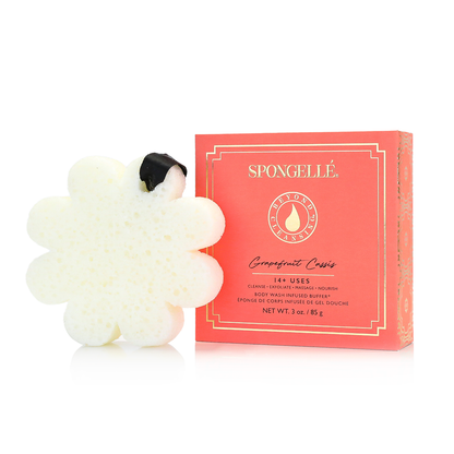 White, flower-shaped bath sponge with black ribbon loop. Available sizes: small, medium, large.
