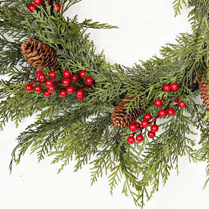510050 - 22in Twig Wreath with real touch cedar, green pine branches, red berries, and brown pinecones; available in 22 inches.