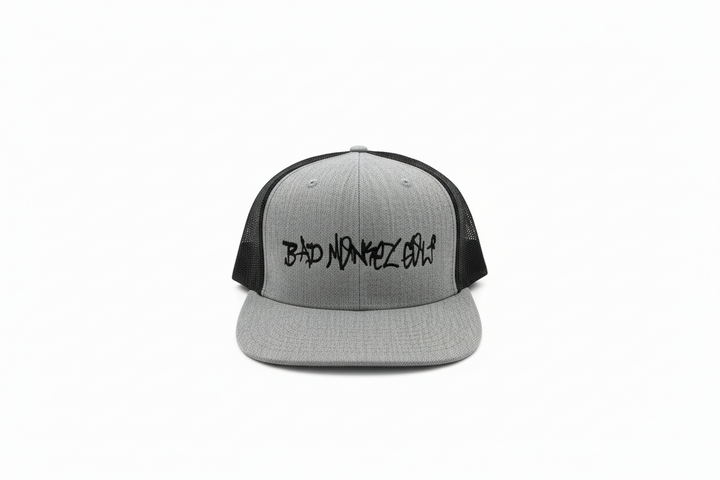 Gray and black Bad Monkey Hat with mesh sides, bold graffiti "Bad Monkey Golf" front. Available sizes: S, M, L, XL.
