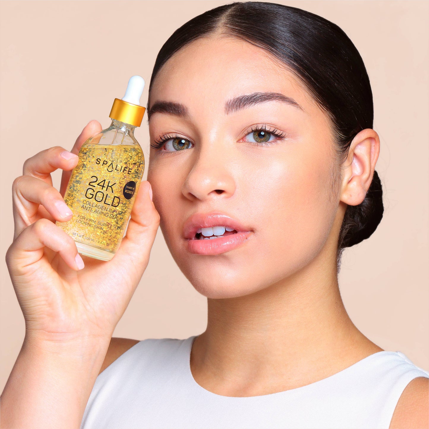 Dropper bottle labeled “Gold 24K Collagen Anti-Aging Serum | Korean Skincare,” known for collagen-boosting, anti-aging benefits; available in 30ml and 50ml sizes.