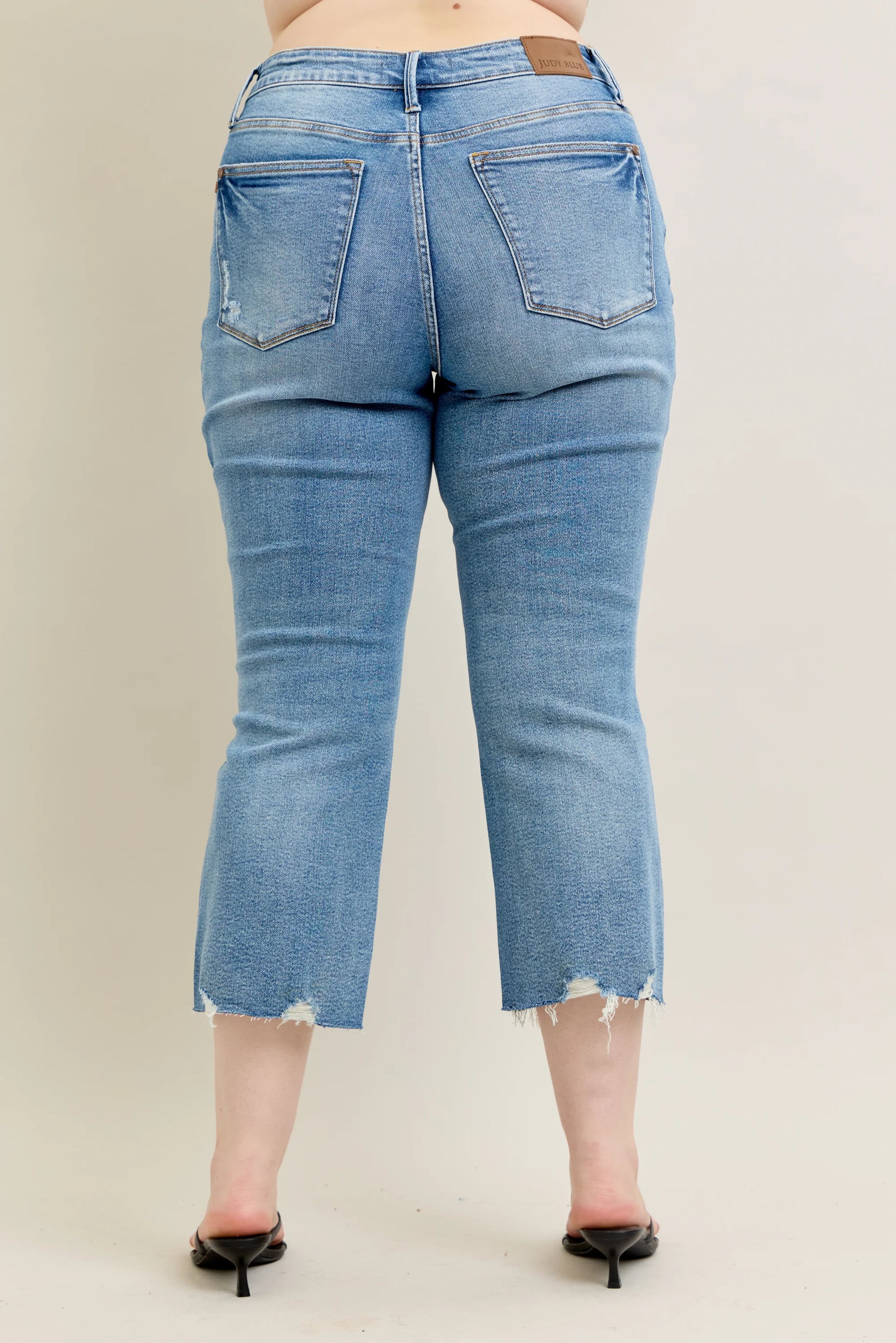 Judy Blue MR Vintage Wash Destroy Hem Kick Flare Jeans with frayed hems, back pocket distressing. Sizes: 0-18W.