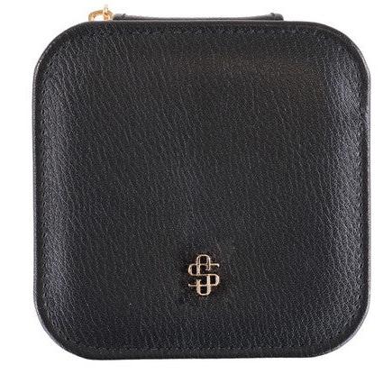 The Simply Southern Leather Jewelry Case is a black, square-shaped PU leather pouch with rounded corners, featuring a small gold emblem and a subtle zipper at the top. Sizes available: One size.